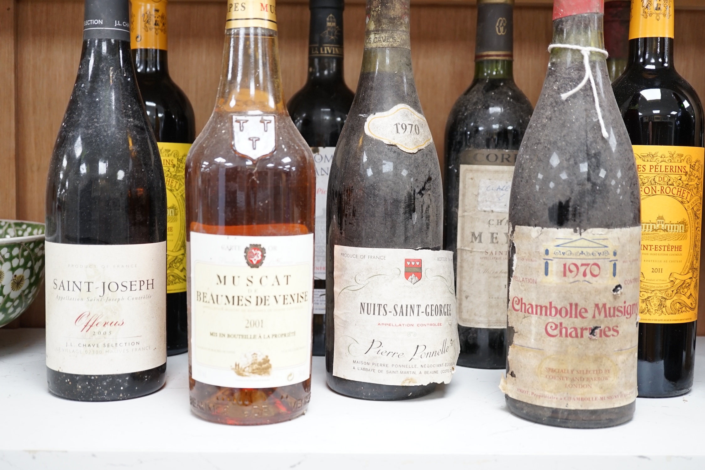 Fifteen various bottles of French wines to include 1970 Nuits-Saint-Georges Pierre Ponnelle, Domaine De Cantaussel Pic St.Martin 2004, etc. Condition - storage unknown